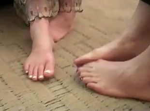 Branlette avec les pieds
